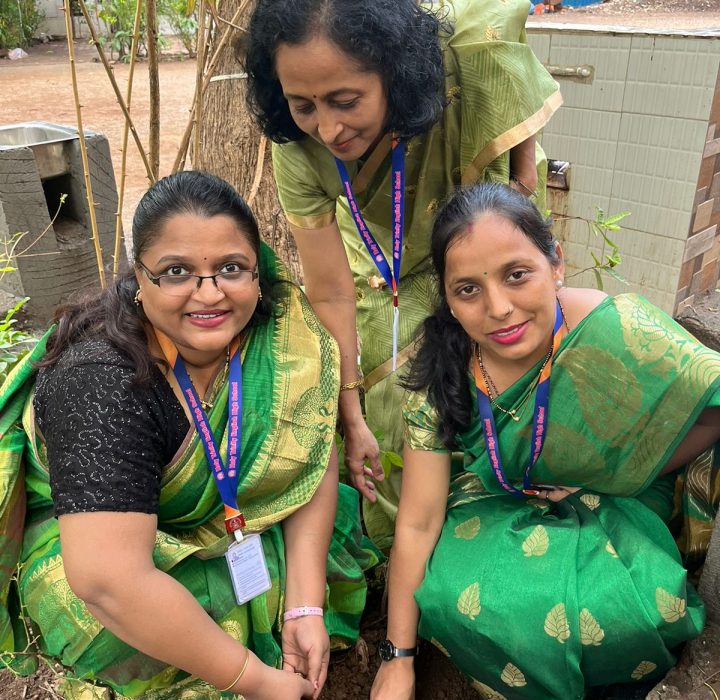 all teachers are planting the trees in the school